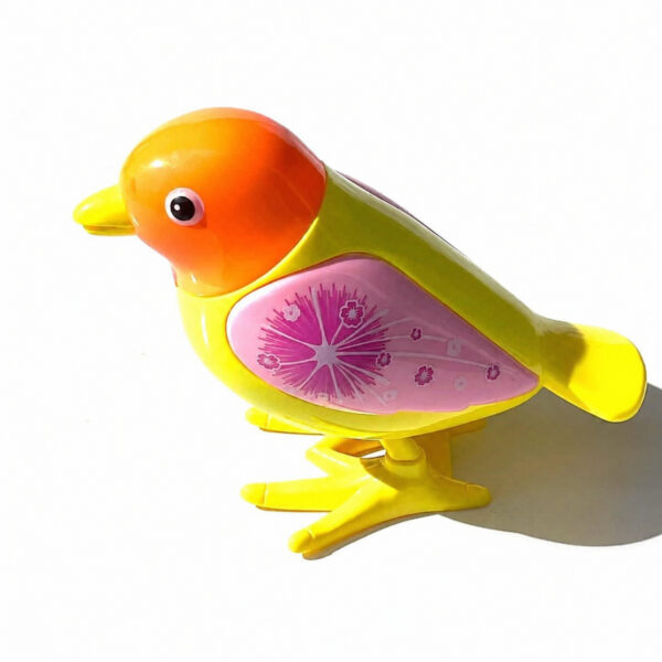 animalute-fidget-care-merg-vrabie-galben-si-portocaliu Animăluțe Fidget care merg, păsărică mecanică galbenă cu cap portocaliu, cioc galben, aripă roz cu model și lăbuțe galbene