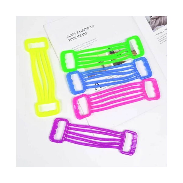 banda-elastica-din-cauciuc-antistres-albastra-3 Bandă elastică din cauciuc, cinci benzi elastice neon (galben, verde, albastru, roz, mov) așezate pe o carte deschisă