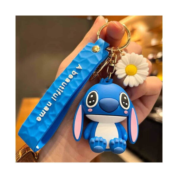 Breloc Lilo & Stitch, Stitch albastru ținut în mână, cu curea albastră imprimată și o floare de mărgăretă