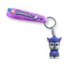 Brelocuri Paw Patrol, cu bandă mov cu inscripția Rainbow și figurină de cățeluș albastru-închis cu șapcă albastră de polițist