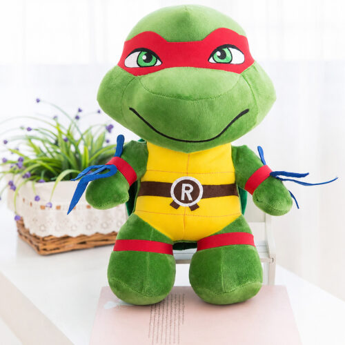 jucarie-de-plus-raphael-teenage-mutant-ninja-turtles Jucărie de pluș Raphael Teenage Mutant Ninja Turtles, țestoasă ninja verde cu mască roșie, plastron galben