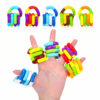 jucarie-fidget-tangle-galbena-si-mov-2 Jucărie Fidget Tangle, montaj: sus cinci jucării Tangle pliate în culori diferite