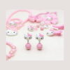Set creativ Hello Kitty 3 în 1: Pop It, prim-plan cu bijuterii: capete albe de Hello Kitty, funde roz
