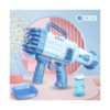 set-de-exterior-vara-albastru-detaliu Set de exterior Vară albastru, pistolul albastru cu mai multe duze în funcțiune, pe fundal roz