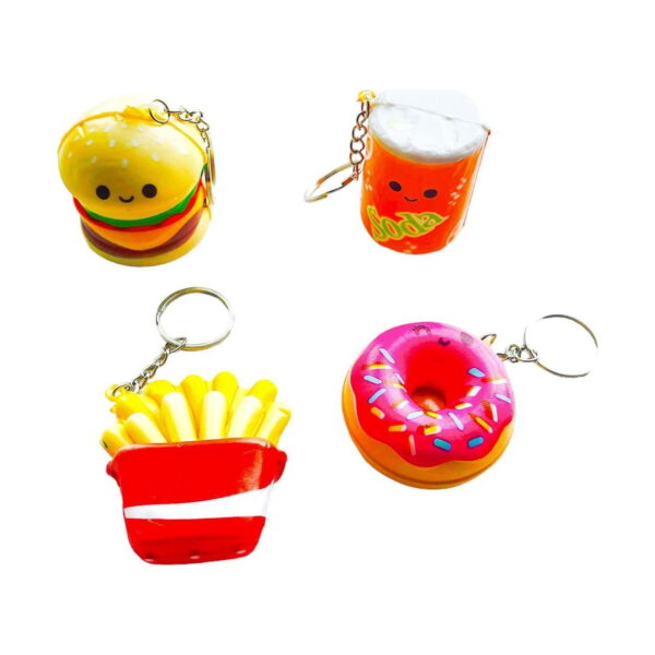 Set squishy Fast Food, squishy-uri așezate în două rânduri: hamburger și pahar sus, cartofi prăjiți și gogoașă jos