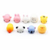 squishy-alb-4 Squishy, zece animăluțe squishy mochi aranjate pe două rânduri: purceluș roz, iepuraș roz, iepuraș alb, focă albă