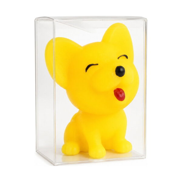 Squishy cățel, squishy galben cu urechi ascuțite, ochi închiși și limba scoasă, într-o cutie transparentă