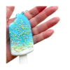 Squishy înghețată Fericire marină, albastră așezată într-o palmă deschisă